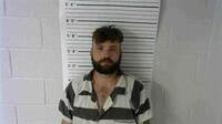 Mugshot of REID, TANNER