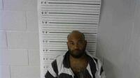 Mugshot of REEVES, AARON